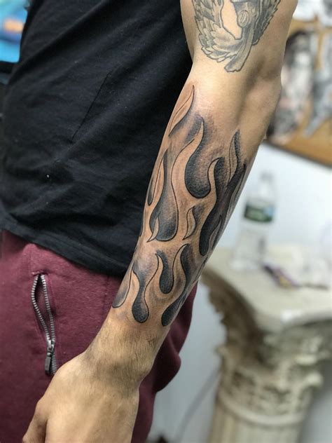 flame tattoos on forearms|realistic flame tattoos.